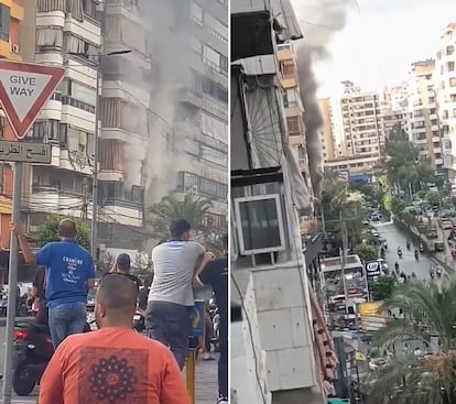 Several passersby observe columns of smoke coming from a building just after the explosion of several walkie-talkies in Beirut on Wednesday. 