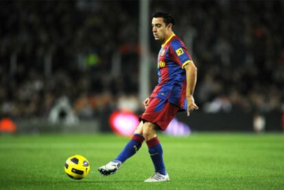 Xavi Hernández, durante el partido ante el Sevilla.