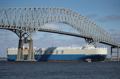 An outbound cargo ship passes under the Francis Scott Key Bridge in 2018.