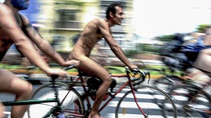 Nude cyclists during a bike rally in Lima, Peru.