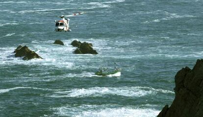 Rescue workers conduct their search around where the Santa Ana went down.