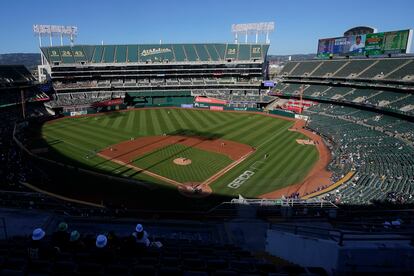 People watch a baseball game at Oakland Coliseum between the Oakland Athletics and the Texas Rangers in Oakland, Calif., July 23, 2022