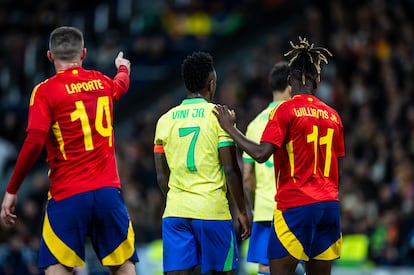 Desde la izquierda, Laporte, Vinícius Junior y Nico Williams.