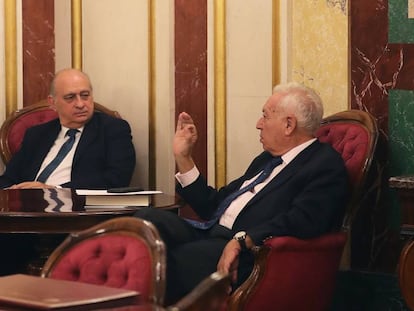 Los exministros Jorge Fernández Díaz y José Manuel García Margallo.