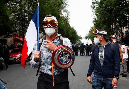 Protestas en París el pasado miércoles contra las medidas anunciadas por Emmanuel Macron para luchar contra el coronavirus.