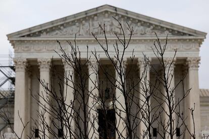 Branches slightly obscure the facade of the U.S. Supreme Court building April 07, 2023 in Washington, DC