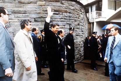 Ronald Reagan moments before the assassination attempt by John Hinckley Jr. on March 30, 1981, at the Washington Hilton in Washington. James Brady is visible third from left, the White House press secretary was hit in the head by a bullet and left partially paralyzed for life.