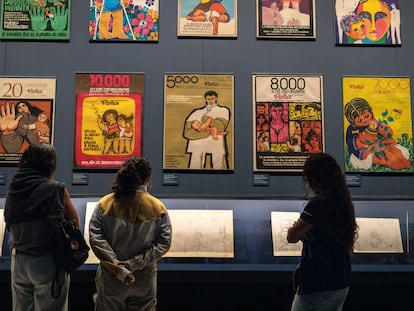 group of people tours the exhibition How to Design a Revolution, at Centro Cultural Palacio de La Moneda, a cultural facility located in Santiago, Chile.