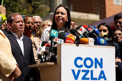 Maria Corina Machado looks on as she addresses the media, after a court upheld a ban preventing her from holding office, in Caracas, Venezuela, January 29, 2024