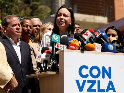 Maria Corina Machado looks on as she addresses the media, after a court upheld a ban preventing her from holding office, in Caracas, Venezuela, January 29, 2024