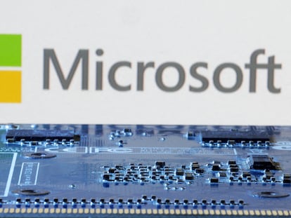 Microsoft logo is seen near computer motherboard in this illustration taken January 8, 2024.