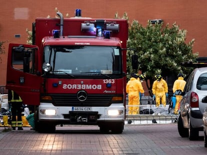 Firefighters disinfect the Monte Hermoso senior residence in March.