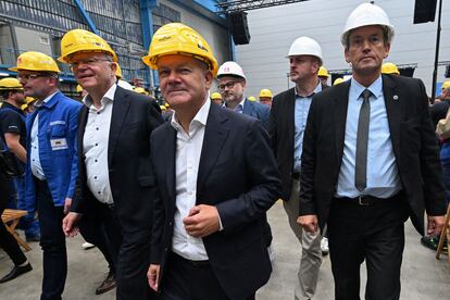 German Chancellor Olaf Scholz during a visit to a plant in one of the German regions.