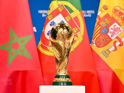 ZURICH, SWITZERLAND - DECEMBER 11: A view of the FIFA World Cup Winner's Trophy with the flags of the FIFA World Cup 2030 hosts Morocco, Portugal and Spain during a trophy shoot at the Home of FIFA on December 11, 2024 in Zurich, Switzerland. (Photo by Harold Cunningham - FIFA/FIFA via Getty Images)