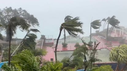 This video grab from the Twitter page of James Reynolds @EarthUncutTV shows tropical storm force winds blowing  across Tumon Bay, Guam on May 24, 2023.