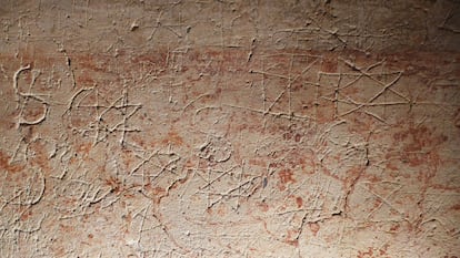 Eight-pointed stars ion one of the walls of the former choir in the church of Santiago de Peñalba (Peñalba de Santiago, León, Spain).