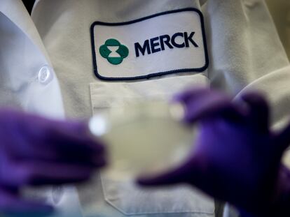 A Merck scientist conducts research on February 28, 2013, in West Point, Pennsylvania.