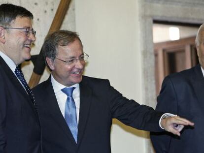 Puig, Moragues y Margallo durante el acto de toma de posesi&oacute;n.