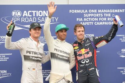 Rosberg, Hamilton y Vettel, tras la clasificación.