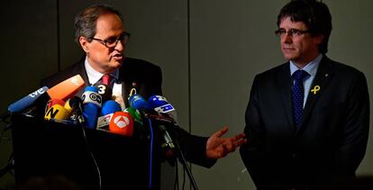 Quim Torra y Carles Puigdemont, durante la rueda de prensa en Berlín.