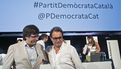 Carles Puigdemont y Artur Mas en la clausura del congreso.