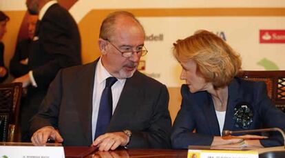 Salgado y el presidente de Caja Madrid, Rodrigo Rato