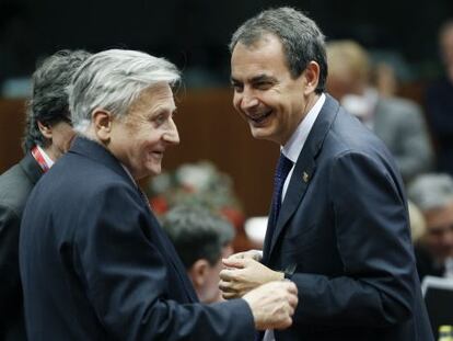 El expresidente del BCE, Jean-Claude Trichet, con Jos&eacute; Luis Rodr&iacute;guez Zapatero, en 2011