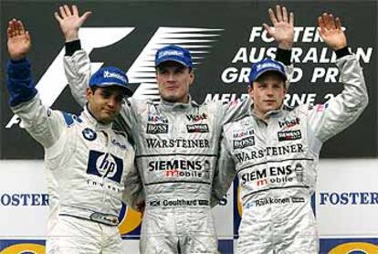 Montoya, Coulthard y Raikkonen, en el podio