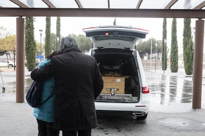 The coffin of an 88-year-old woman who died from the coronavirus is taken to the crematory. 