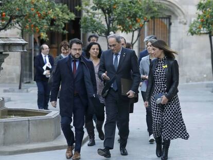El presidente de la Generalitat, Quim Torra, acompañado por el vicepresidente Pere Aragonés y la 'consellera' Meritxell Budó.