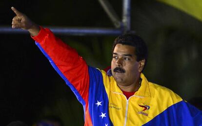 Venezuelan interim President Nicol&aacute;s Maduro celebrates following the election results in Caracas on April 14, 2013. 