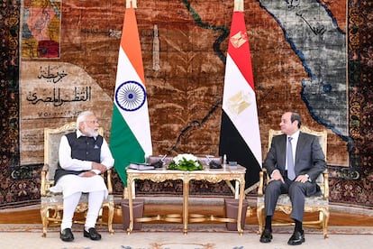 Egyptian President Abdel Fattah El-Sisi speaks with Indian Prime Minister Narendra Modi during their meeting.