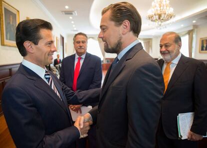 Peña, DiCaprio y Slim, tras la reunión.