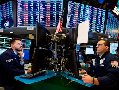 Traders work on the floor of the New York Stock Exchange in New York on February 5, 2018.