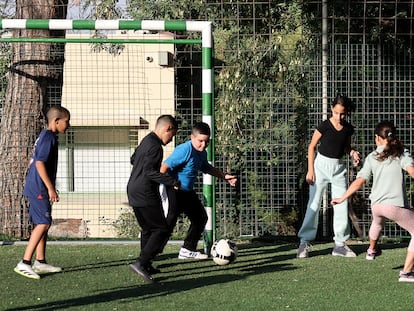 A group of children from Neve Shalom play soccer at the elementary school in this town, where Jews and Israeli Arabs have chosen to live together.