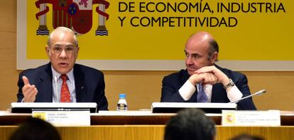 OECD Secretary-General Ángel Gurría (left) and Spain's Economy Minister Luis de Guindos.