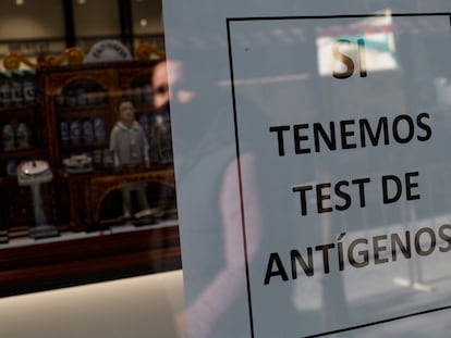 A sign outside a Madrid pharmacy on Wednesday advertising availability of antigen tests.