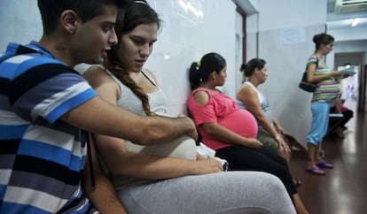 A young mother at a medical clinic in Buenos Aires.