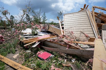 Debris litters a home following a Sunday night tornado that swept through Louin, Miss., Monday, June 19, 2023.  (AP Photo/Rogelio V. Solis)