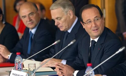 Hollande y Ayrault, en un acto en París.