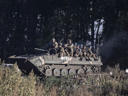 Ukrainian soldiers on patrol in the Kharkiv region on September 9 after a counter-offensive liberated dozens of localities.