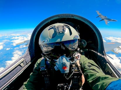 In this photo released by Xinhua News Agency, a Chinese fighter jet pilot from the Chinese People's Liberation Army takes part in combat readiness patrol and military exercises around Taiwan on April 9, 2023.