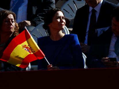 La presidenta de la Comunidad de Madrid, Isabel Díaz Ayuso, asiste al desfile del Día de la Fiesta Nacional, este miércoles en Madrid.