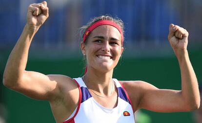 Monica Puig celebra la victoria sobre Muguruza.