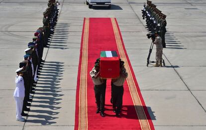 In this Tuesday, Oct. 6, 2015 photo made available by the Emirates News Agency WAM, the body of Emirati soldier Khamis Rashid Al Abdouli who was killed in Aden arrives at Al Bateen Airport, Abu Dhabi, United Arab Emirates, Tuesday, Oct. 6, 2015. Suicide car bombings targeting exiled Yemeni officials and the Saudi and Emirati troops backing their efforts to retake the country killed at least 15 people Tuesday in the port city of Aden, authorities said. A new Islamic State affiliate claimed responsibility for the assault, which officials earlier blamed on Yemen's Shiite rebels. (WAM via AP)