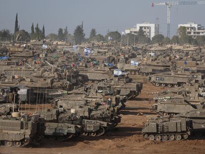 Armored vehicles gather near the border with Gaza, at an unspecified site in southern Israel, this Thursday.