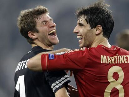 Müller y Javi Martínez, tras eliminar al Juventus.