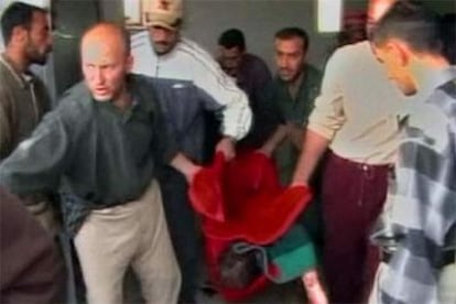 Imagen tomada de un vídeo filmado por un estudiante iraquí de periodismo tras la matanza de 24 civiles en Haditha.