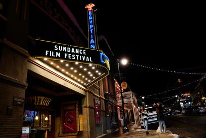 Pedestrians take photos of the marquee of the Egyptian Theatre before the 2023 Sundance Film Festival, Wednesday, Jan. 18, 2023, in Park City, Utah. The annual independent film festival runs from Jan. 19-29.