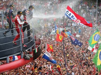 Vettel, Webber y Alonso, con el público de Monza.